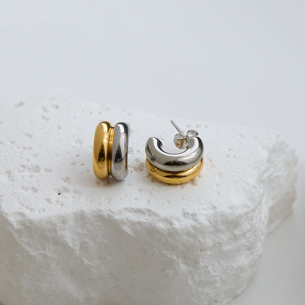 Gold and silver earring